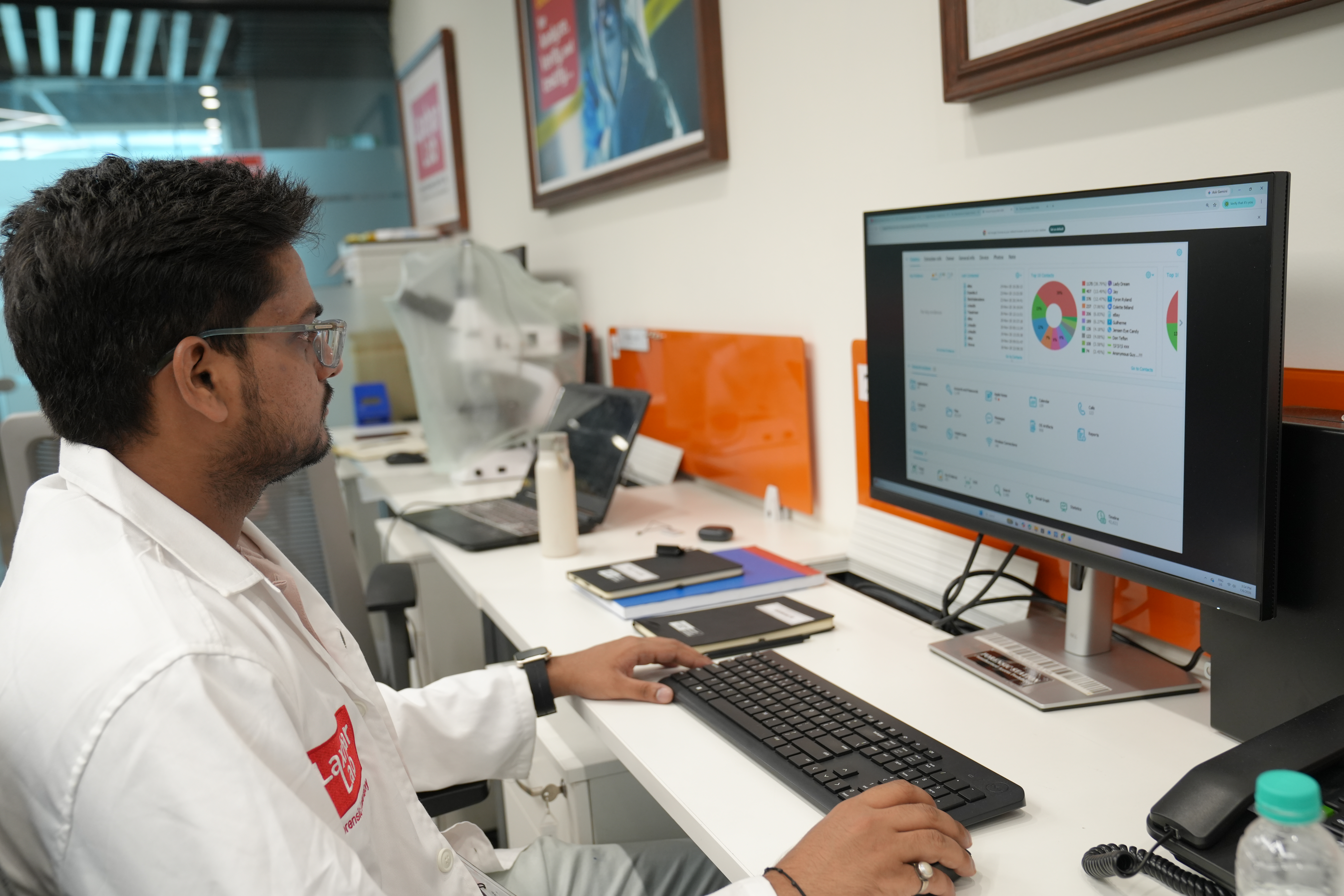 team member working in desktop